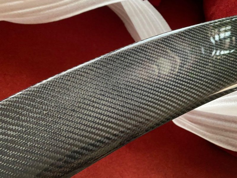 w205_carbon_fiber_boot_spoiler_1611908492_9429e099_progressive.jpg